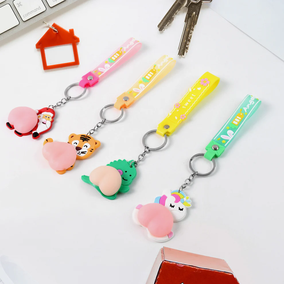 MultiFun Silicone Keychain – Stress Toy & Strap Combo (Mix Design) (1-pc)